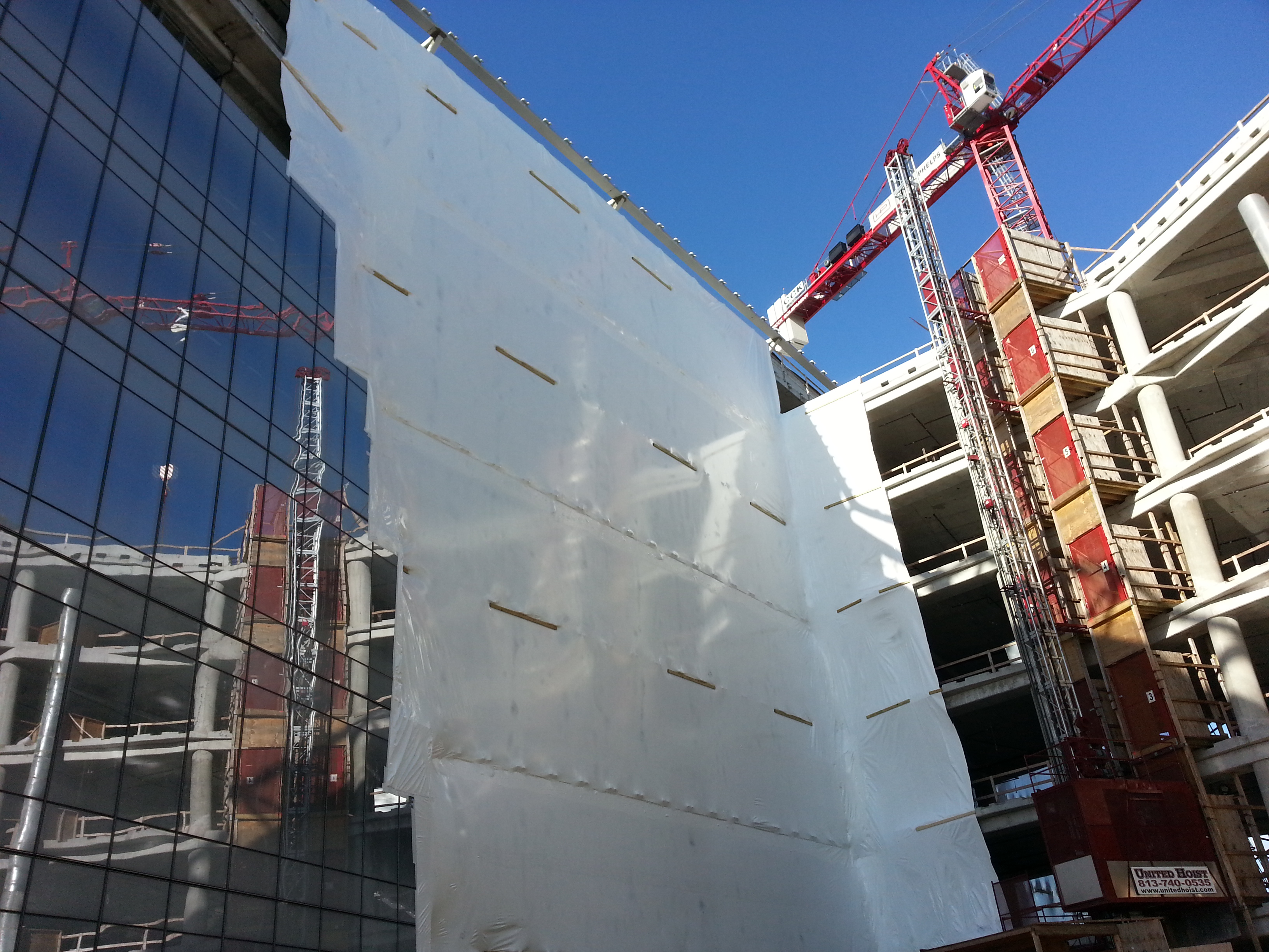Curtainwall Delays Needed Shrink Wrap Containment